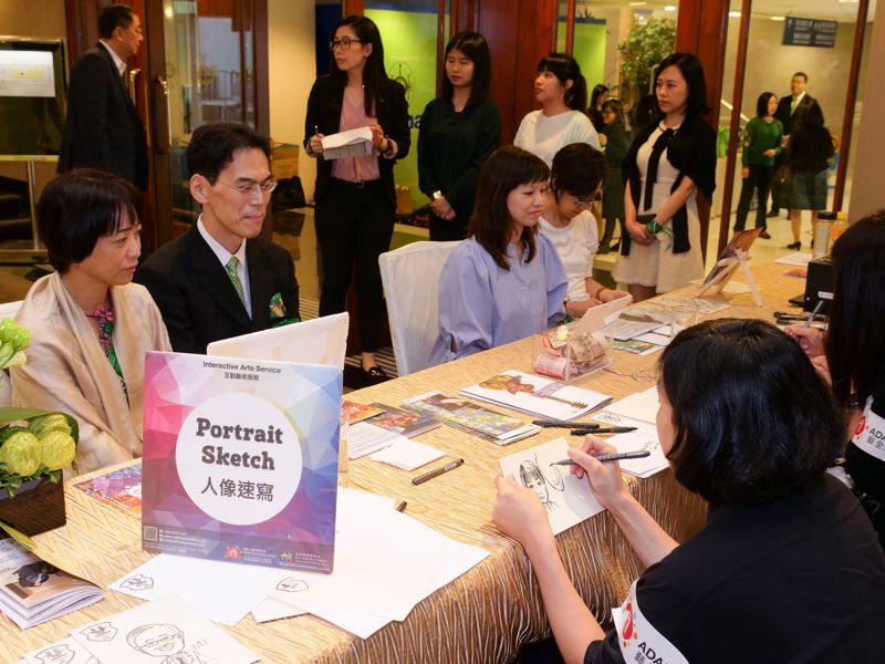 Two disabled artists from the Arts with the Disabled Association of Hong Kong were invited to provide portrait sketch service.
